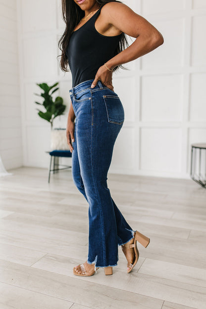 Charity Mid Rise Distressed Hem Bootcut Jeans